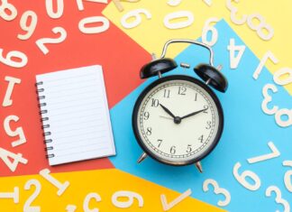 Chemnitzer Linux-Tage 2024 Alarm Clock Lying on Multicolored Surface